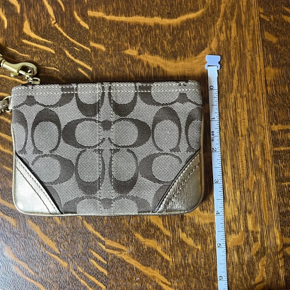 Coach Signature Canvas Wristlet in khaki and gold